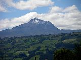 Ecuador Cotopaxi 01-03 Sincholagua On The Drive From Quito Sincholagua (4898m) is visible on the drive down the Avenue of the Volcanoes between Quito and Cotopaxi. Sincholagua was climbed for the first time on February 23, 1880 by Edward Whymper, Jean-Antoine Carrel, and Louis Carrel.